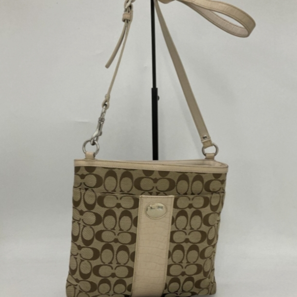 Coach Tan Crossbody Bag with Signature Pattern and Leather Strap